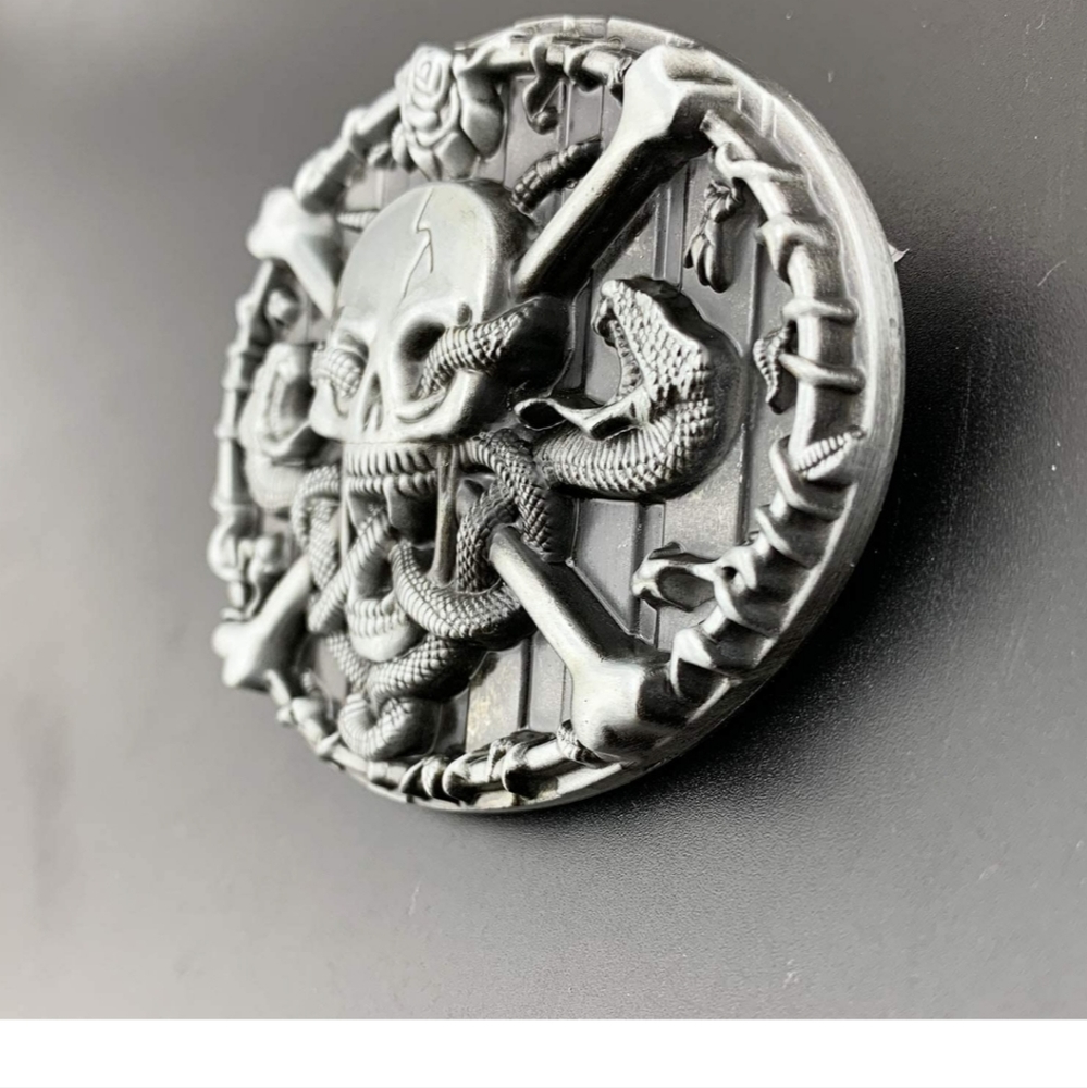 New skull and crossbones snake belt buckle approximately 3 inch wide